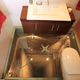 Image for article titled This Toilet Is the Perfect Place To Sit When Perched On a Glass Floor Over a 15 Story Shaft